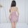 Woman wearing sheer purple lace chemise with heart pattern, bodycon fit mini dress sleepwear from back view.