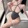 Woman wearing nightsigh nightseduce sexy lace bodysuit, a seductive sleepwear and no-remove uniform outfit, posing by a batht...