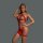 Woman modeling red sheer mesh bodysuit with rhinestone trim and cut-out details.