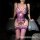 Woman modeling purple lace backless lingerie set with sheer mesh bra, steel underwire, and matching bodysuit with garters.