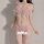 Woman modeling pink lace sheer lingerie set with bralette, thong, and thigh-high stockings for seductive allure.
