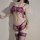 Woman wearing purple lace sheer lingerie set with thong, bralette, and stockings — seductive see-through design for pure temp...