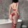 Woman wearing red nightsigh lace bodysuit with open-crotch, cut-outs, and mesh details in a modern bathroom setting.