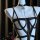 Sexy secretary costume: black strappy bodysuit with chain choker for women, bondage & role play lingerie.