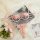 Pink lace lingerie set with floral details, elegant euro-style design for women, displayed with roses and pearls.
