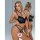 Woman modeling leopard print lace lingerie set with push-up bra and matching panty, featuring side support and anti-droop des...
