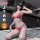 Woman in red qqny pure allure sleepwear set, elegant seductive lingerie with lace details, posing confidently indoors.