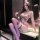 Woman in qingshe lace lingerie set with underwire, removable pads, and garter straps—sensual bridal or date night look.