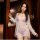 Woman wearing qingran summer sexy cover-up bikini set with butterfly hip tie and lingerie-style top, sheer white robe over la...