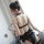 Woman wearing qingran black lace bridal garter set with sheer chiffon thong and floral trim, back view showing delicate strap...