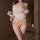 Woman wearing yellow sakura passion lingerie set with sheer white cover-up, featuring wet-look bikini and bow details for bed...