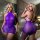 Woman modeling shiny purple sheer bodysuit with high neck and open back, form-fitting plus size dress for intimate play.
