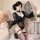 Woman in black sheer lace bodysuit with garter stockings, holding fan; pure & seductive lingerie set 2874.