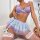 Woman wearing purple lace bra and pastel tulle skirt lingerie set with bow details.