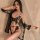 Sexy sheer butterfly top with lace detailing, paired with a tie-up bodysuit set, complemented by elegant sheer outerwear ense...