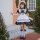 A young girl wears a japanese girl black maid dress, featuring a cute lolita princess costume with ruffled sleeves and skirt,...