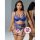 Woman modeling blue qimengya lace thong set with thigh rings, featuring sheer panels and adjustable straps for a seductive lo...