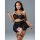 Woman modeling black sheer mesh lace lingerie set with thigh rings, featuring a bra, garter belt, and stockings.