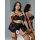Woman modeling black sheer mesh lace lingerie set with thigh rings, featuring a 3-piece sexy sleepwear design.