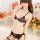 Woman modeling suoqing sexy lace lingerie set with transparent open-crotch thong and peekaboo bra top.
