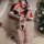 Sexy santa-themed lingerie set featuring velvet bunny costume with heart thong design, perfect holiday outfit.