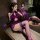 A woman poses elegantly in a purple velvet lace-up sensual cheongsam nightgown, featuring a no-remove design, perfect for sex...