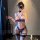 Woman in mirror selfie wearing sexy 4-piece lingerie set with underwire bra, bondage straps, and thigh rings.