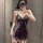 A woman poses in a purple lace sheer sleep dress, featuring an off-shoulder design and floral trim details. the bodycon fit a...