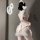Sexy nurse costume set featuring a seductive no-remove lingerie sleepwear with a bow-tie skirt and round neck design.