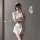 Sexy nurse costume set featuring a seductive white outfit with a bow-tie skirt and round neck design, perfect for themed even...