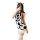 A woman poses with a cow-themed outfit featuring a sleeveless dress adorned with black spots, paired with white knee-high soc...