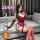 Elegant sensual lingerie set featuring a form-fitting bodice and thigh-high stockings, perfect for luxury bedroom wear.