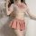 Japanese schoolgirl-themed lingerie set featuring a sheer transparent crop top with a sailor-style bow and a plaid pleated sk...