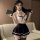 A stylish ensemble featuring a white halter top with black accents and a matching skirt, perfect for secretarial cosplay or i...