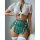 Sexy style passion lingerie set featuring a plaid mini skirt, sheer top with tie-front design, and thigh-high stockings for...