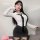 Sexy white blouse with black tie, paired with a form-fitting black skirt, perfect for roleplay outfits.