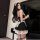 Elegant black maid costume with lace details, perfect for cosplay or roleplay. includes stockings and garter belt for a sensu...