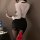 Woman wearing zimei sexy nightwear set, featuring sheer blouse and tight-fitting skirt, paired with leopard print stockings a...