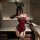 Sexy red bodysuit with lace details, bunny ears, thong back design, open-crotch style, perfect for bold fashion statements.