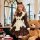 A charming maid outfit featuring a sweet french-inspired design, complete with puffed sleeves and an apron, perfect for a del...