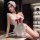 Sexy maid costume set featuring lace details and a red bow, perfect for cosplay with matching apron and lingerie.