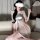 A woman elegantly poses in an ancient chinese style sheer chiffon hanfu dress, featuring a seductive palace-inspired design w...