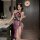 A woman poses elegantly in a luxurious bathroom, wearing a purple high-slit cheongsam lingerie set. the sheer design features...