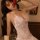 Seductive backless lace sleepwear featuring sheer transparent cheongsam style bodycon design with halter neck and high neckli...
