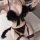 Sexy black maid costume with feathered bow and tail, perfect for role play and romantic nights.
