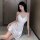 Elegant white satin nightgown with delicate lace detailing, perfect for romantic sleepwear and seductive evening outfits.