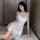 Elegant white satin slip dress with delicate spaghetti straps, perfect for romantic evenings. ideal backless slip dress and m...