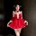 A charming model showcases a festive christmas red velvet babydoll dress set, featuring delicate lace details and playful bow...