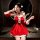 A woman poses elegantly in a festive christmas red velvet babydoll dress set, featuring intricate lace details and charming b...