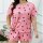 Trendy womens sexy print lounge set featuring a loose short sleeve top and shorts with playful black heart patterns, perfect ...